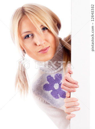 Woman beside whiteboard 12648382