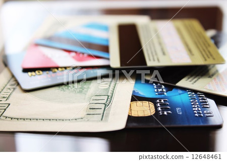 Credit cards and banknote (macro) 12648461