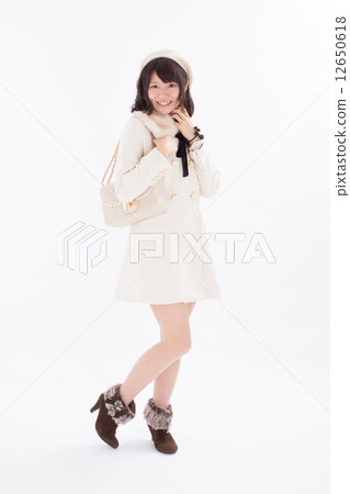 Girls wearing pretty autumn / winter costumes Girls wearing pretty autumn / winter costumes 12650618
