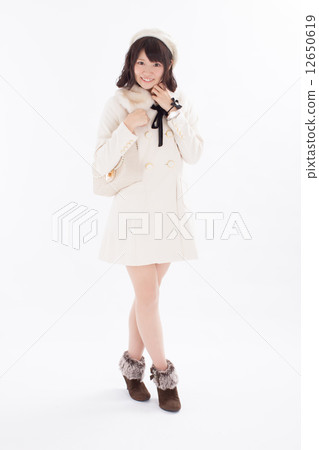 Girls wearing pretty autumn / winter costumes Girls wearing pretty autumn / winter costumes 12650619