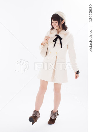 Girls wearing pretty autumn / winter costumes Girls wearing pretty autumn / winter costumes 12650620