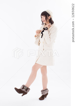 Girls wearing pretty autumn / winter costumes Girls wearing pretty autumn / winter costumes 12650622