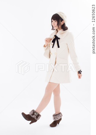 Girls wearing pretty autumn / winter costumes Girls wearing pretty autumn / winter costumes 12650623
