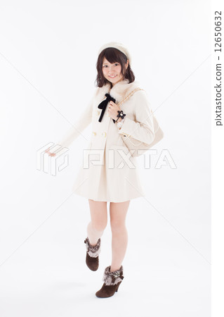 Girls wearing pretty autumn / winter costumes Girls wearing pretty autumn / winter costumes 12650632