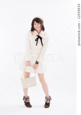 Girls wearing pretty autumn / winter costumes Girls wearing pretty autumn / winter costumes 12650634