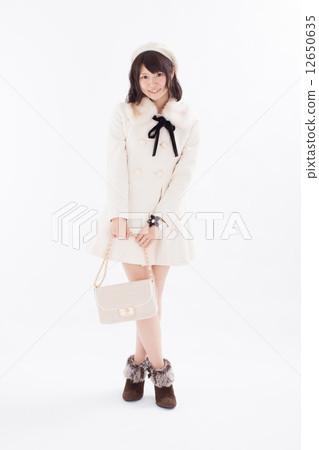 Girls wearing pretty autumn / winter costumes Girls wearing pretty autumn / winter costumes 12650635