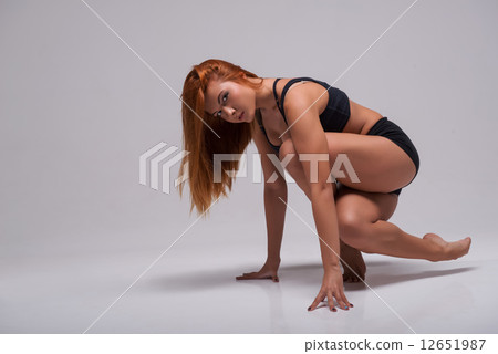 Woman gymnast stretching 12651987