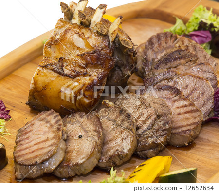 steak with asparagus and salad on a white background in restaurant steak with asparagus and salad on a white background in restaurant 12652634