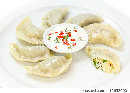 Nepalese food momo on a white background in the restaurant Nepalese food momo on a white background in the restaurant 12652660