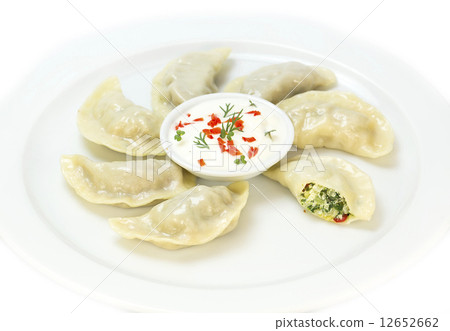 Nepalese food momo on a white background in the restaurant Nepalese food momo on a white background in the restaurant 12652662