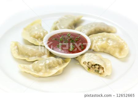 Nepalese food momo on a white background in the restaurant Nepalese food momo on a white background in the restaurant 12652665