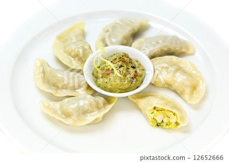 Nepalese food momo on a white background in the restaurant Nepalese food momo on a white background in the restaurant 12652666
