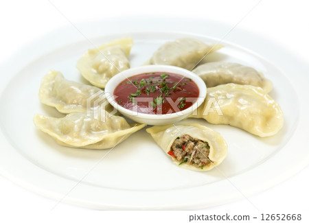 Nepalese food momo on a white background in the restaurant Nepalese food momo on a white background in the restaurant 12652668