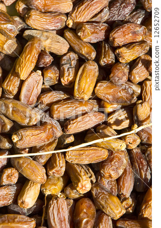 background of ripe fruit of date palms background of ripe fruit of date palms 12652709