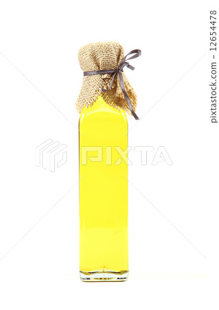 Olive oil in glass bottle on white background. Olive oil in glass bottle on white background. 12654478