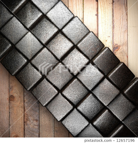 metal on wooden background metal on wooden background 12657196