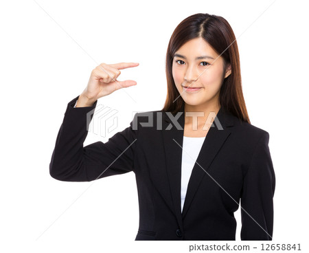 Asian businesswoman finger with small size 12658841