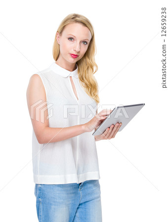 Woman use of digital tablet Woman use of digital tablet 12659238