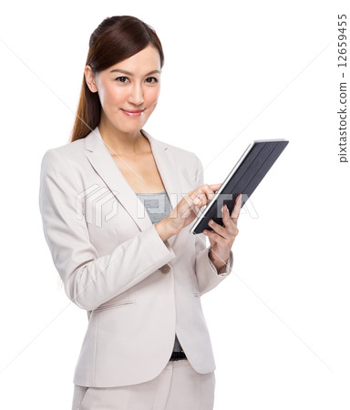 Asian businesswoman touch on digital tablet 12659455