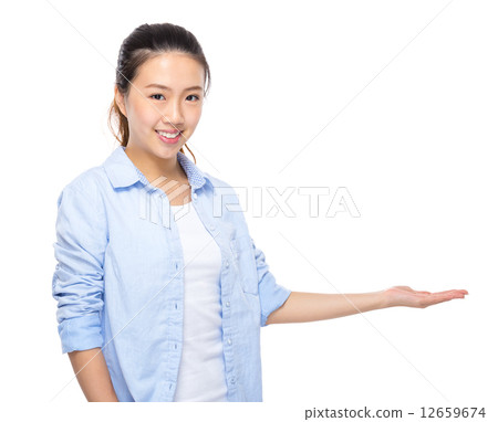 Asian young woman present 12659674