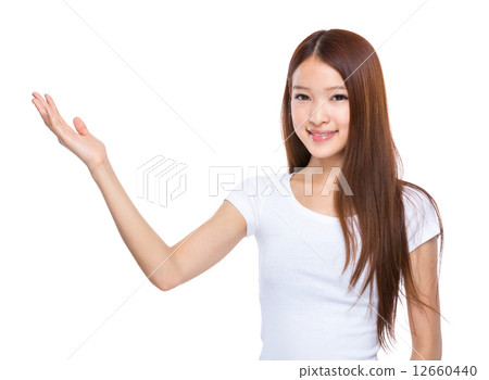 Asian woman present 12660440