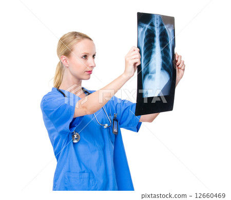 Female doctor hold with x ray Female doctor hold with x ray 12660469
