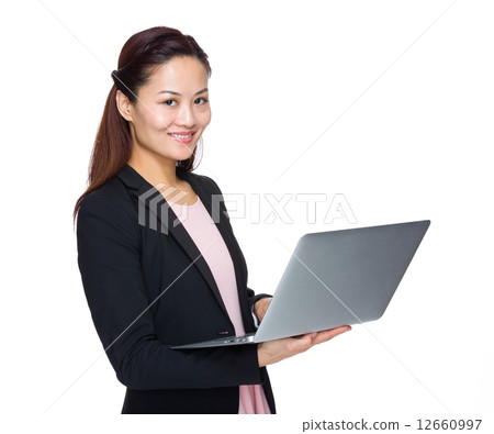 Business woman use portable computer Business woman use portable computer 12660997