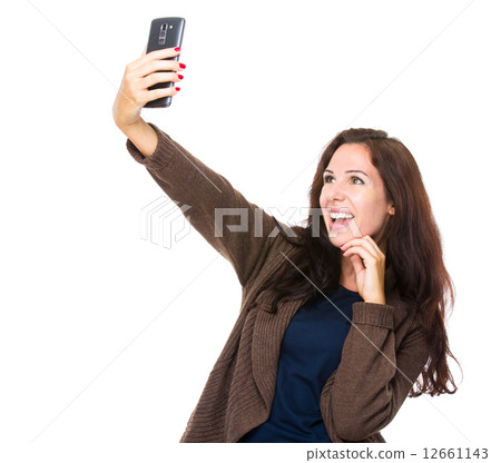 Woman take selfie with mobile phone Woman take selfie with mobile phone 12661143
