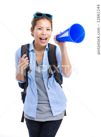 Asian female traveler yell with megaphone 12661144
