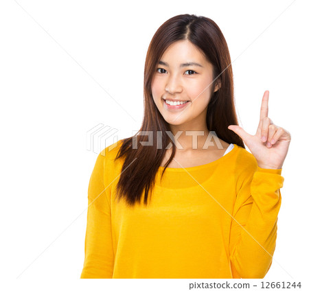Asian young woman with tick sign Asian young woman with tick sign 12661244