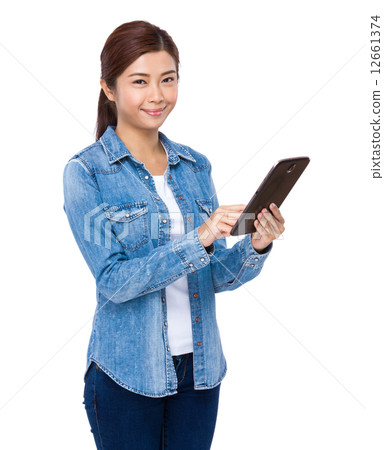 Asian woman use digital tablet 12661374