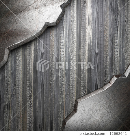 metal on wooden background 12662641