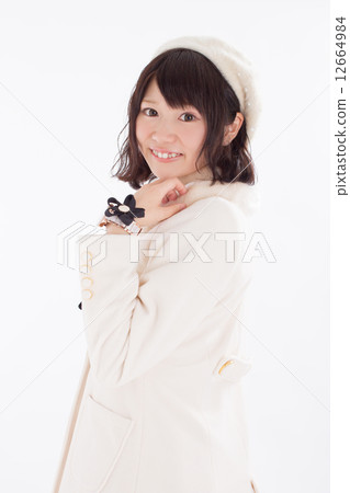 Fashionable girls wearing costumes in a lovely winter Fashionable girls wearing costumes in a lovely winter 12664984