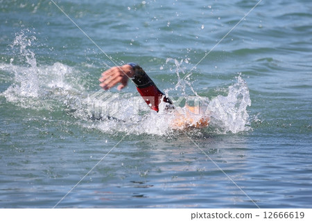 Triathlon Swimming Competitors - Swimer in Triathlon Race 12666619