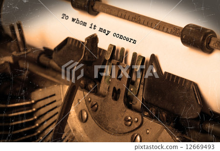 Old typewriter with paper 12669493