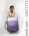 A girl in a school bag 12671773