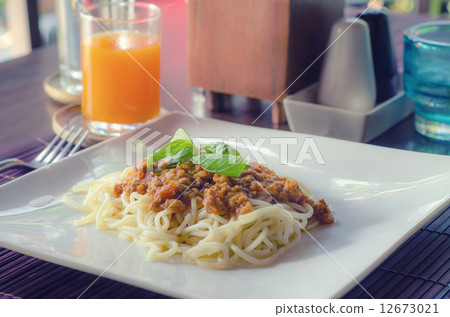 Pasta with tomato sauce basil and grated parmesan Pasta with tomato sauce basil and grated parmesan 12673021