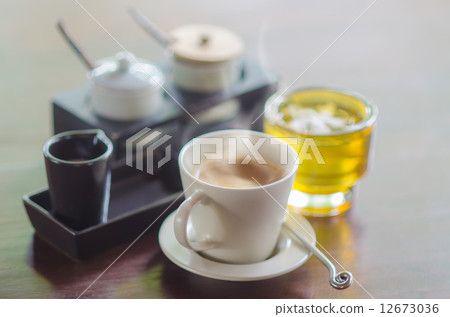 Coffee Cup and Green tea On Table 12673036