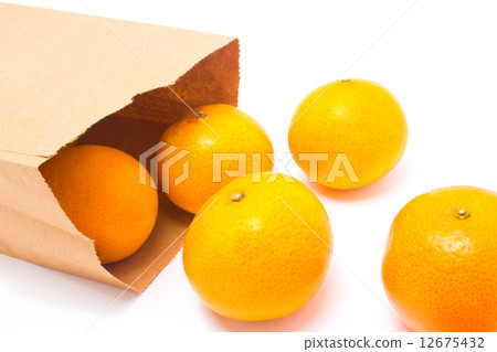 Oranges falling from paper bag, isolated on white background. Oranges falling from paper bag, isolated on white background. 12675432