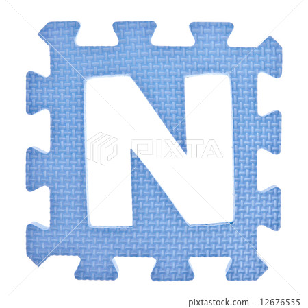 Alphabet toy piece isolated on white background 12676555