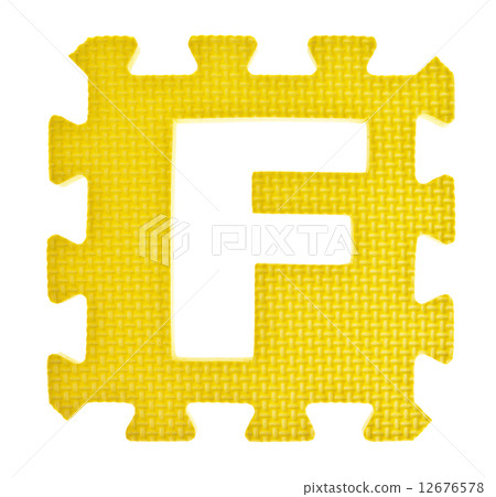 Alphabet toy piece isolated on white background 12676578