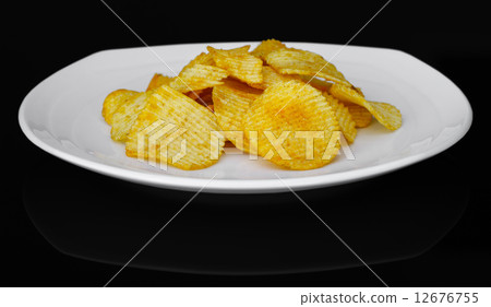Potato chips on a plate 12676755