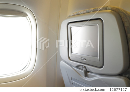 LCD screen in airplane seat 12677127