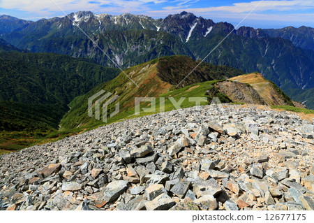 Sword and Tateyama mountain peak seen from the summit of the Northern Alps / Kashima Spire Mountain peak 12677175