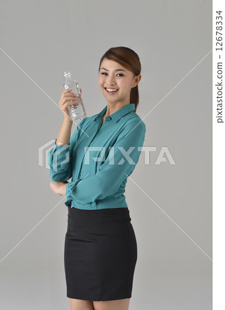 Asian Lady with bottle water 12678334
