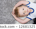 cute baby lying on back 12681325