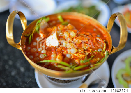 sour soup with red caviar 12682574
