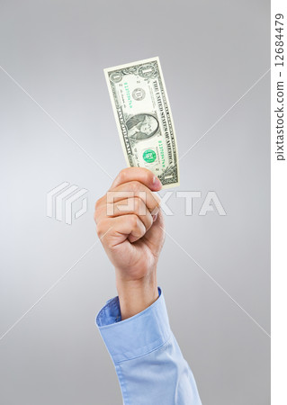 Businessman hand hold US dollar 12684479