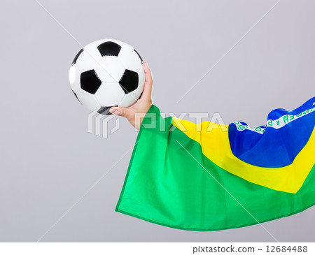 Man arm hold soccer ball 12684488