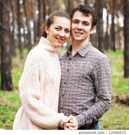 young couple in love outdoors on a sunny day young couple in love outdoors on a sunny day 12686615